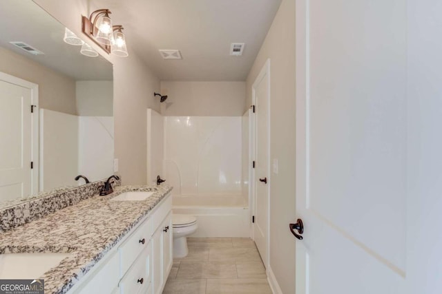 full bathroom featuring tile floors, toilet, vanity, and bathtub / shower combination