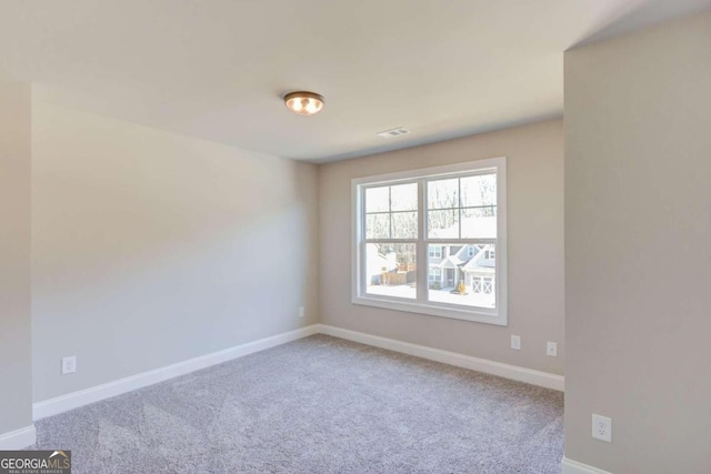 view of carpeted spare room