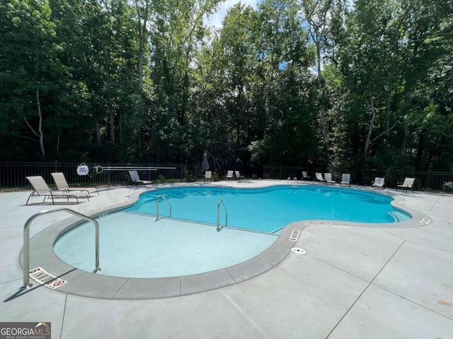 view of pool with a patio