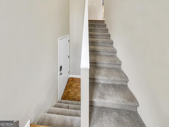 stairs with parquet flooring