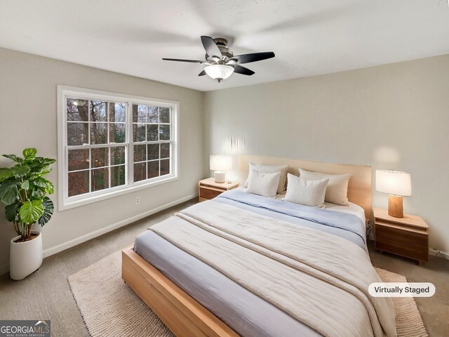 bedroom with carpet flooring and ceiling fan