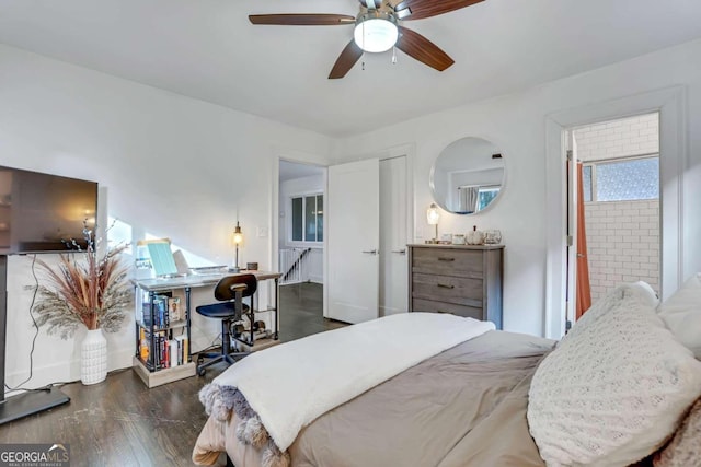 bedroom featuring ceiling fan and dark hardwood / wood-style floors