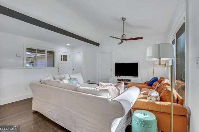 living room with ceiling fan and dark wood-type flooring