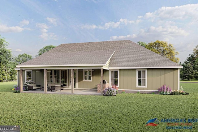 rear view of house with a patio, a yard, and outdoor lounge area