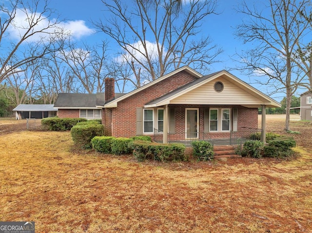 single story home featuring a porch