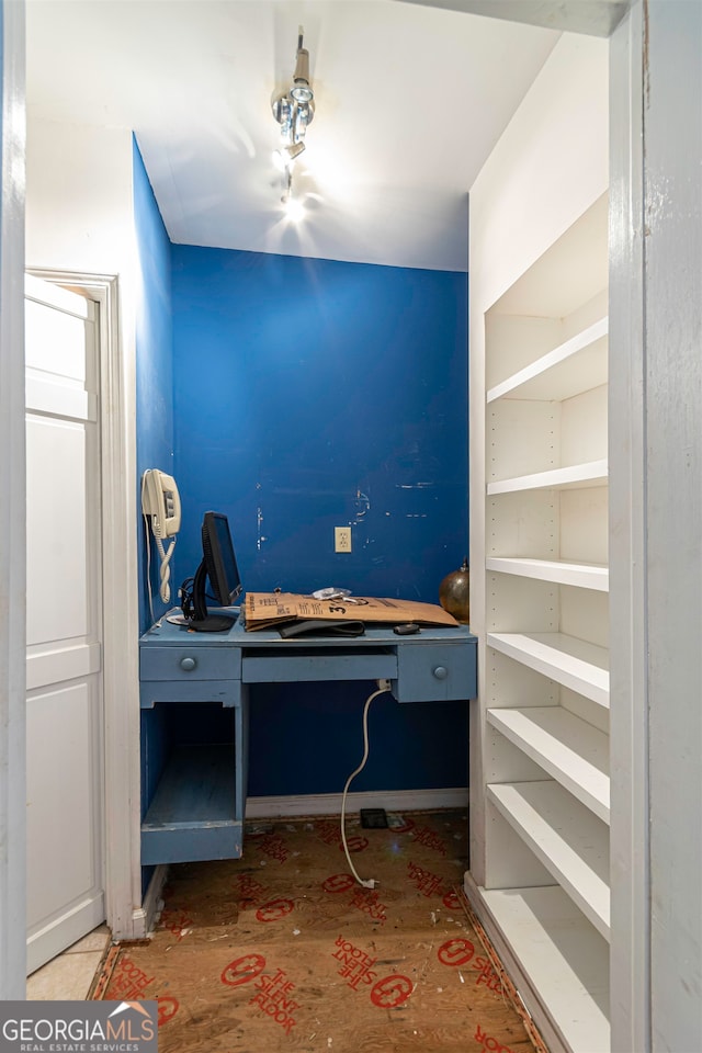 home office featuring dark wood-type flooring