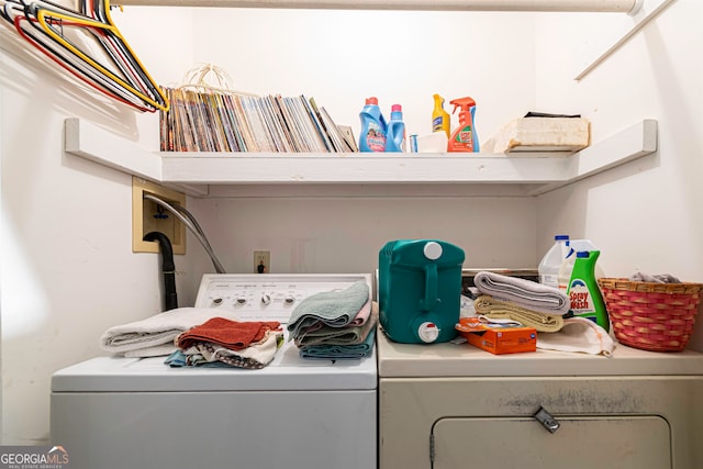 laundry room with washing machine and clothes dryer and hookup for a washing machine