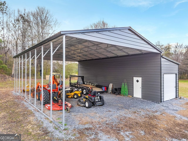 exterior space featuring a carport and a garage