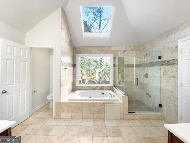 full bathroom with toilet, vanity, lofted ceiling, and tile floors