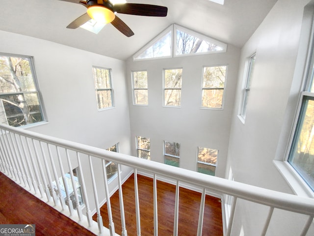 interior space featuring high vaulted ceiling, ceiling fan, and hardwood / wood-style floors