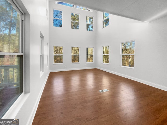 unfurnished sunroom featuring a wealth of natural light