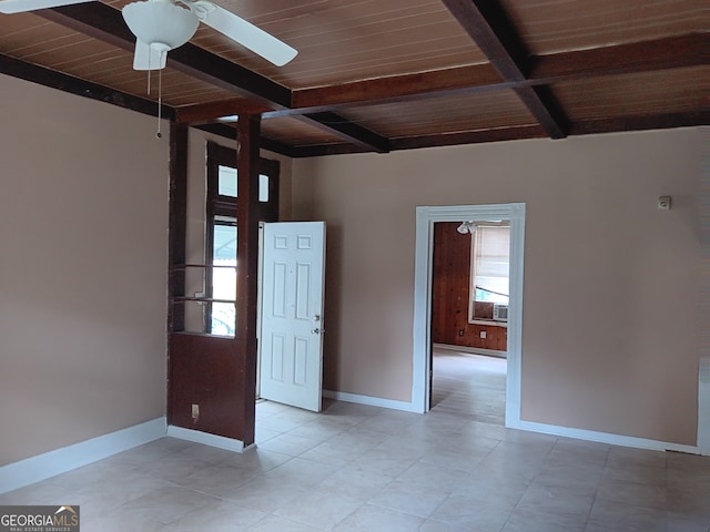 empty room featuring wooden ceiling, ceiling fan, beam ceiling, and light tile floors