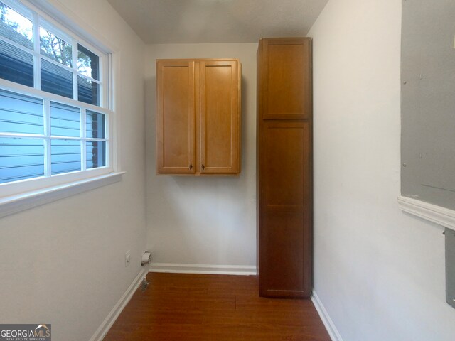 interior space with dark wood-type flooring