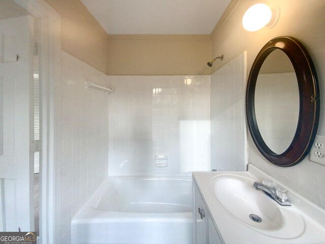 bathroom featuring tub / shower combination and vanity