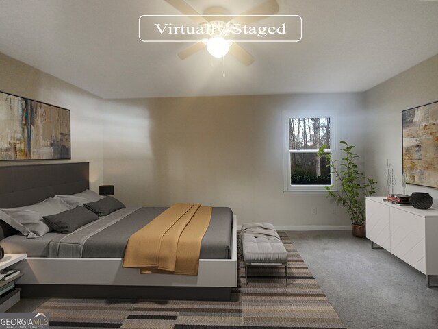 carpeted bedroom featuring ceiling fan