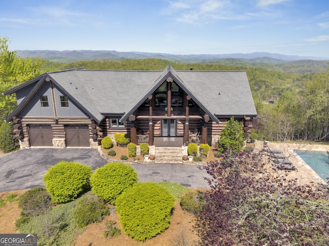 log cabin with a garage