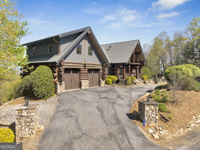 log cabin with a garage