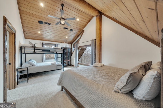 bedroom with wood ceiling, vaulted ceiling, ceiling fan, and carpet