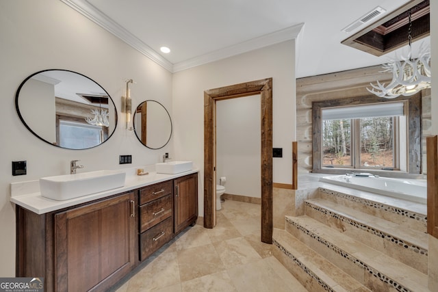 bathroom with oversized vanity, tiled tub, toilet, double sink, and tile floors