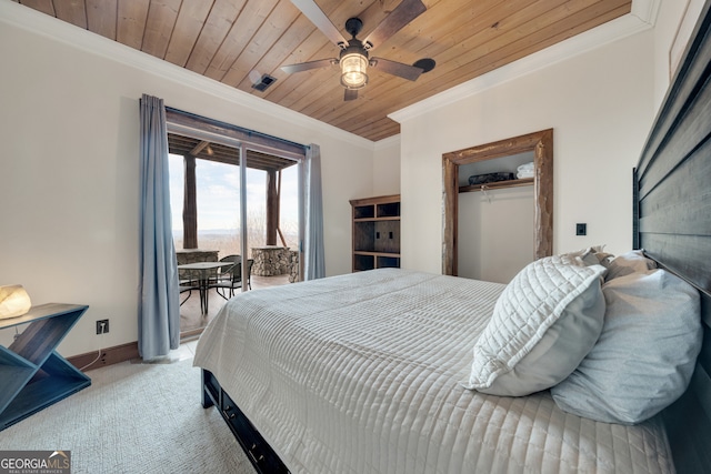 bedroom with a closet, wooden ceiling, ornamental molding, light colored carpet, and ceiling fan