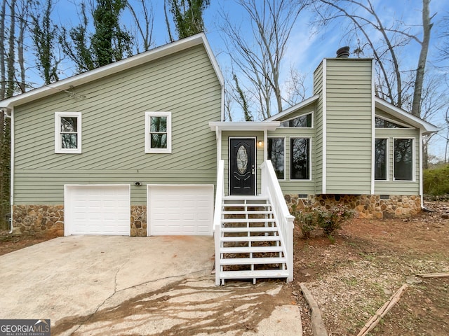 view of front of home with a garage