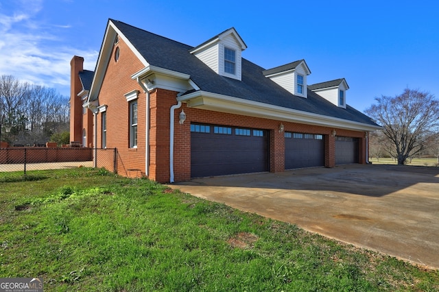 view of property exterior featuring a garage