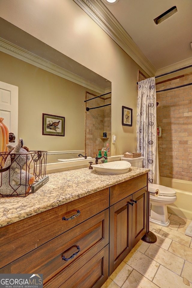 full bathroom with shower / bath combo with shower curtain, tile floors, toilet, and vanity with extensive cabinet space