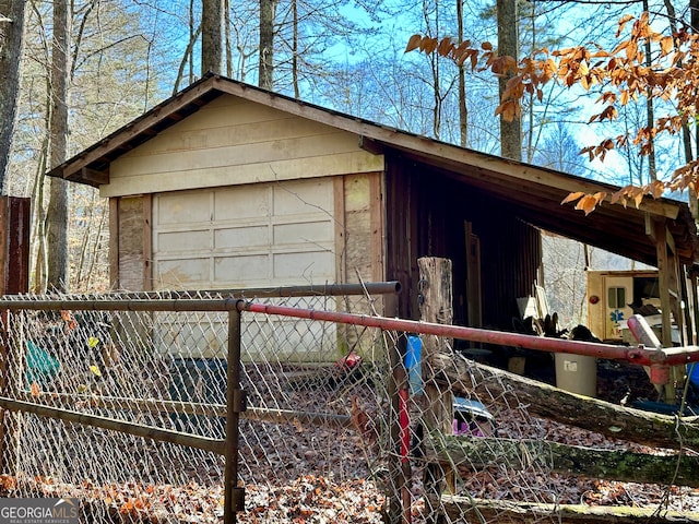 view of outdoor structure with a garage