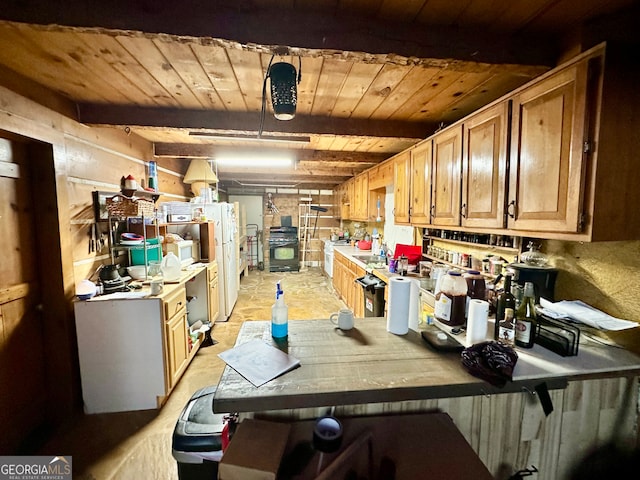 kitchen featuring beamed ceiling, a breakfast bar, and wooden ceiling