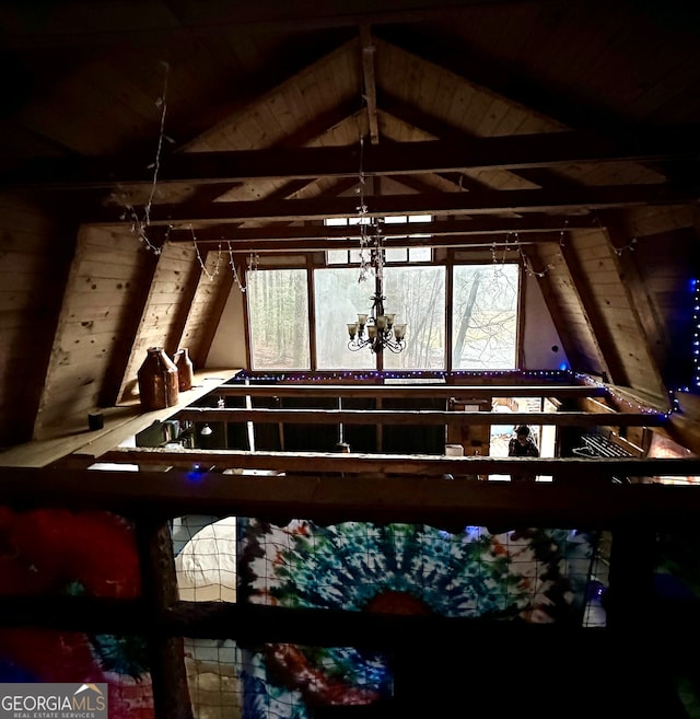 misc room with a chandelier, lofted ceiling with beams, and wooden ceiling