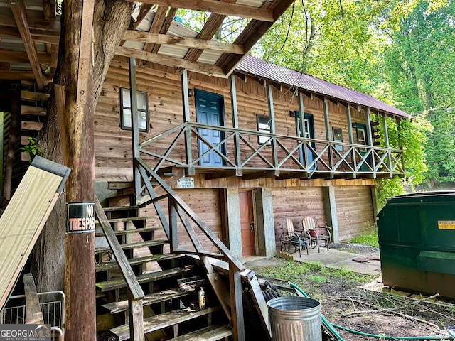 back of property featuring a patio area