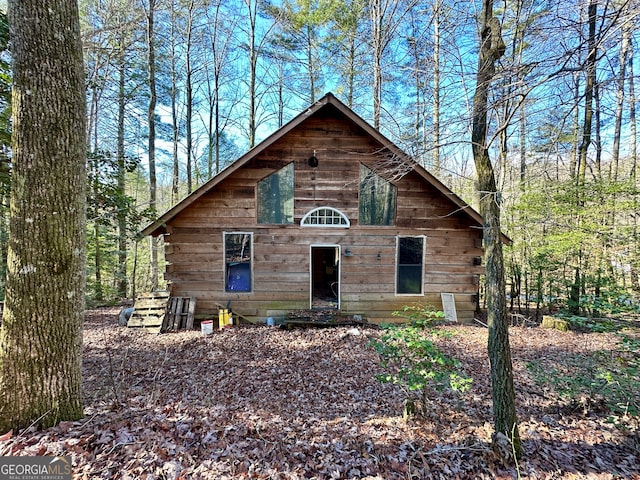 view of log-style house