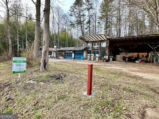 view of yard featuring a carport