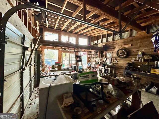 garage with wood walls