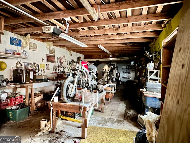 garage with a workshop area