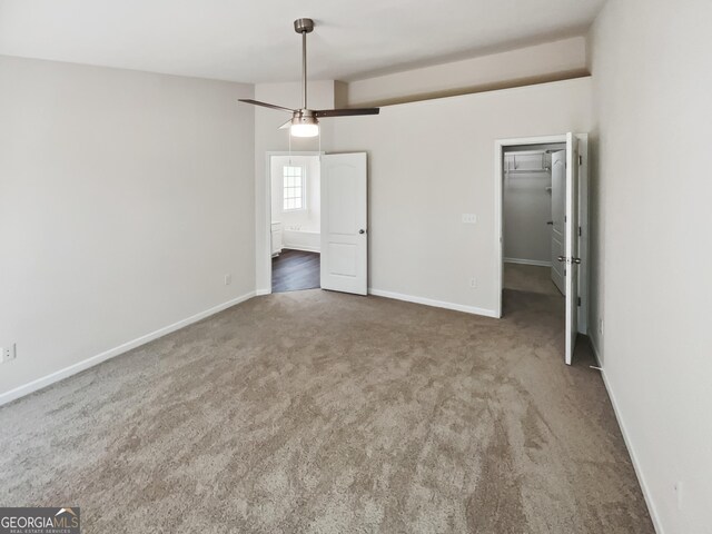 338 Hunterian Pl, Newnan, GA 30265 - carpeted spare room featuring a ceiling fan and baseboards