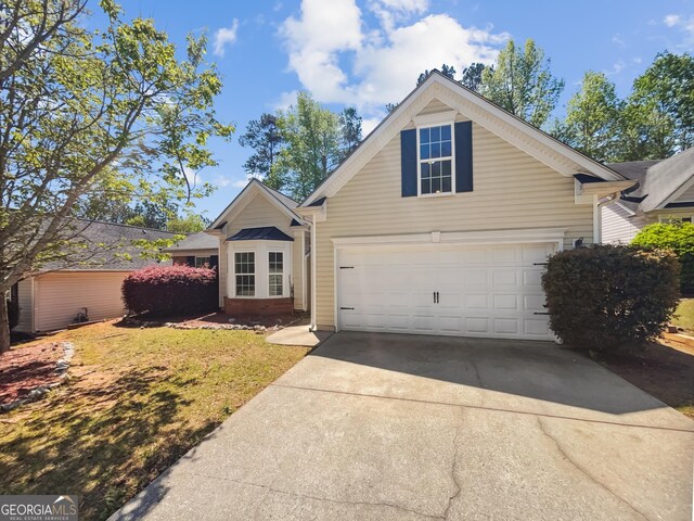 338 Hunterian Pl, Newnan, GA 30265 - traditional-style home with concrete driveway