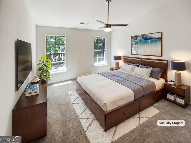 338 Hunterian Pl, Newnan, GA 30265 - carpeted bedroom with a ceiling fan and visible vents
