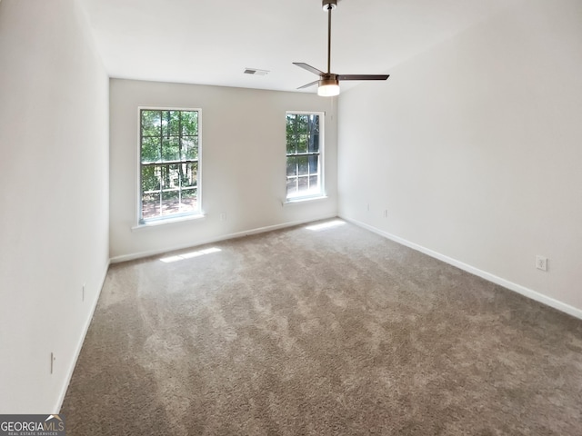 338 Hunterian Pl, Newnan, GA 30265 - carpeted spare room featuring ceiling fan, baseboards, and visible vents