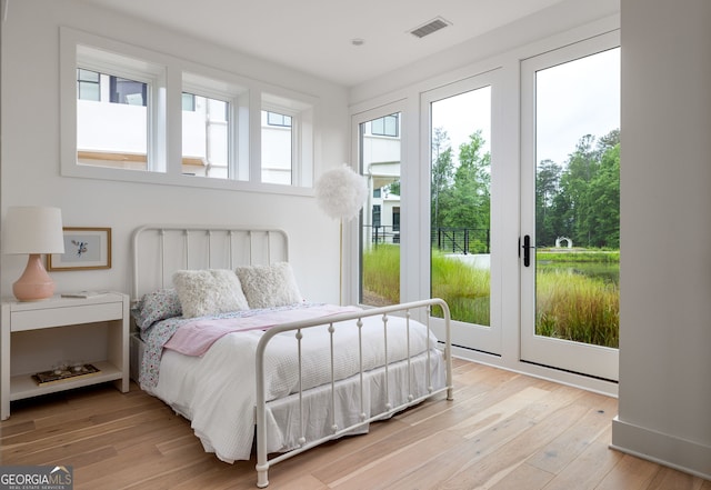 bedroom featuring light hardwood / wood-style flooring