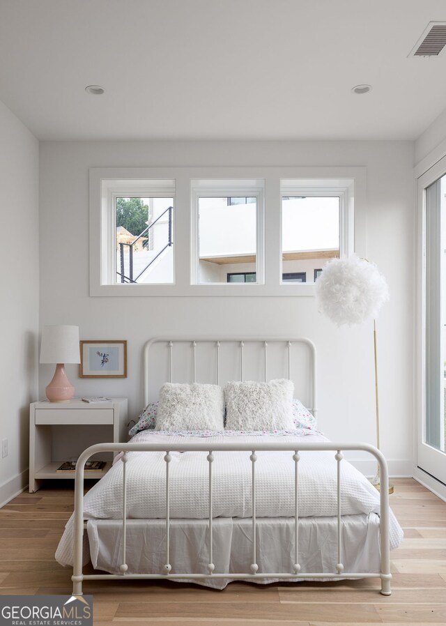 bedroom featuring light hardwood / wood-style flooring