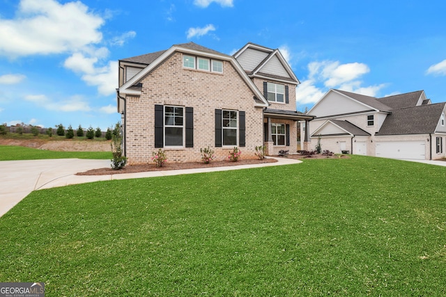 view of front of property with a garage and a front yard