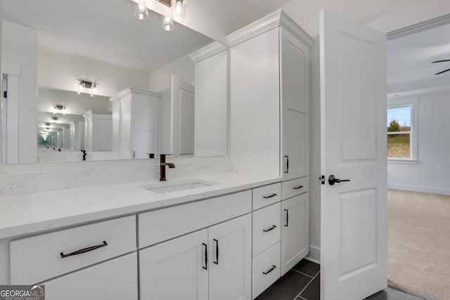 bathroom with vanity, tile patterned flooring, and ceiling fan