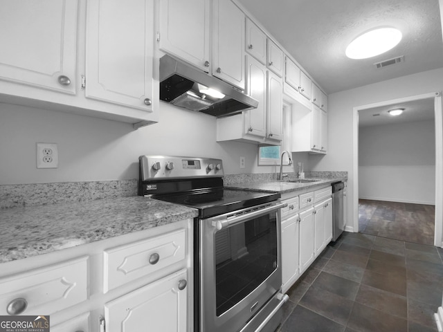 kitchen with visible vents, appliances with stainless steel finishes, under cabinet range hood, white cabinetry, and a sink