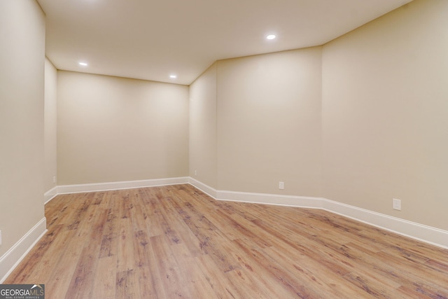 empty room with light wood-type flooring