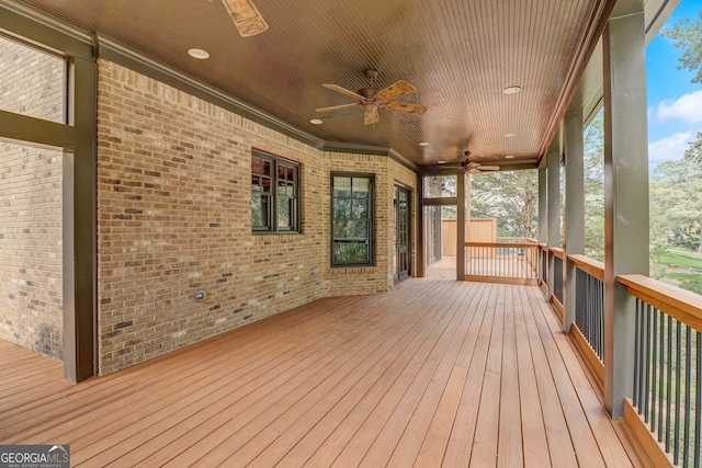 wooden deck with ceiling fan