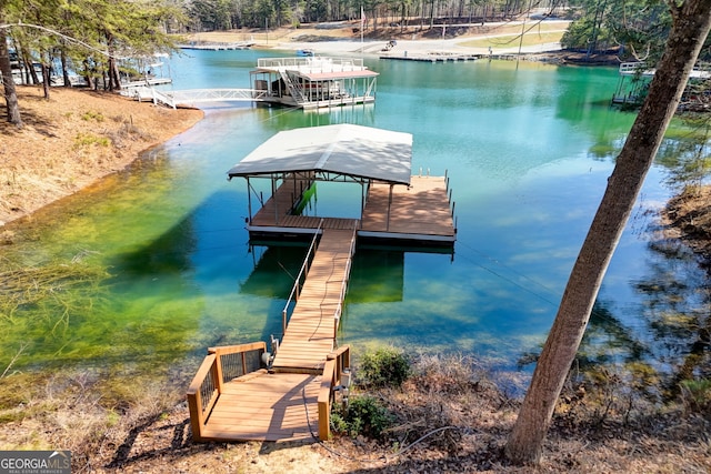 dock area featuring a water view