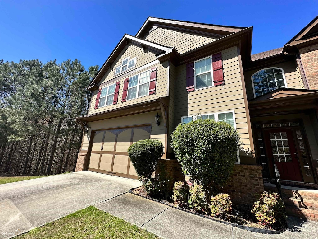 view of front of property featuring a garage