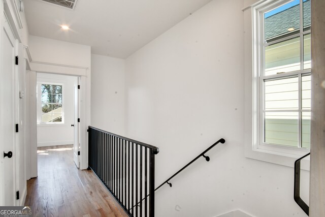 hallway with light wood-type flooring