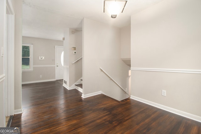 unfurnished room featuring hardwood / wood-style flooring